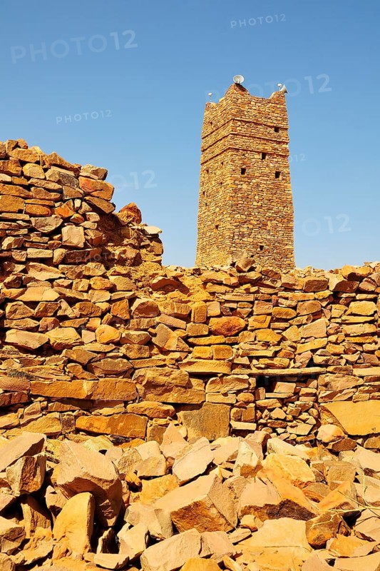 Ruins and minaret of the fortified trading post or Ksar