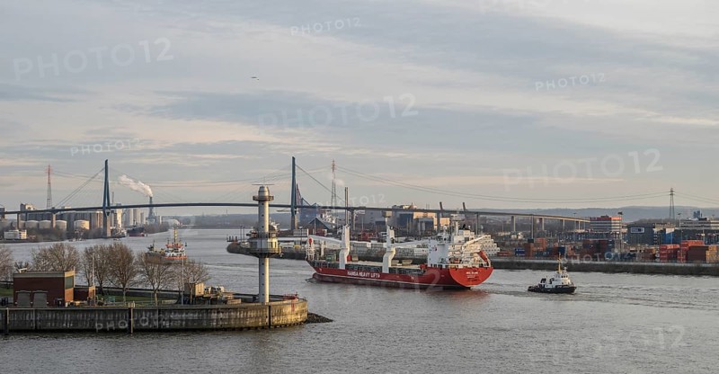 Container ship going under the Kohlbrand bridge