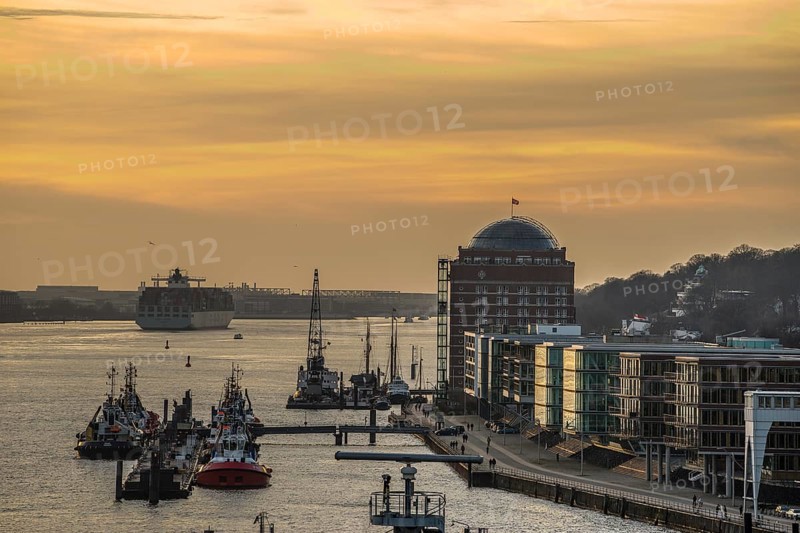Harbour with pilot boats at sunset