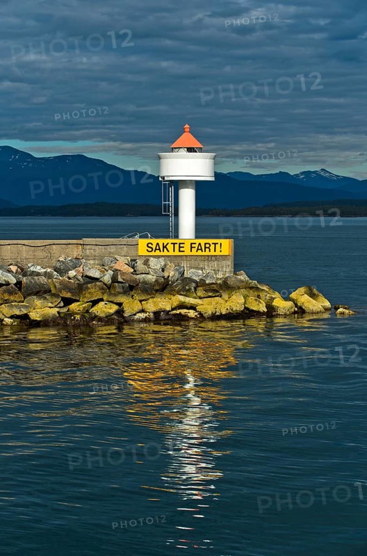 Molde lighthouse with sail slowly warning sign