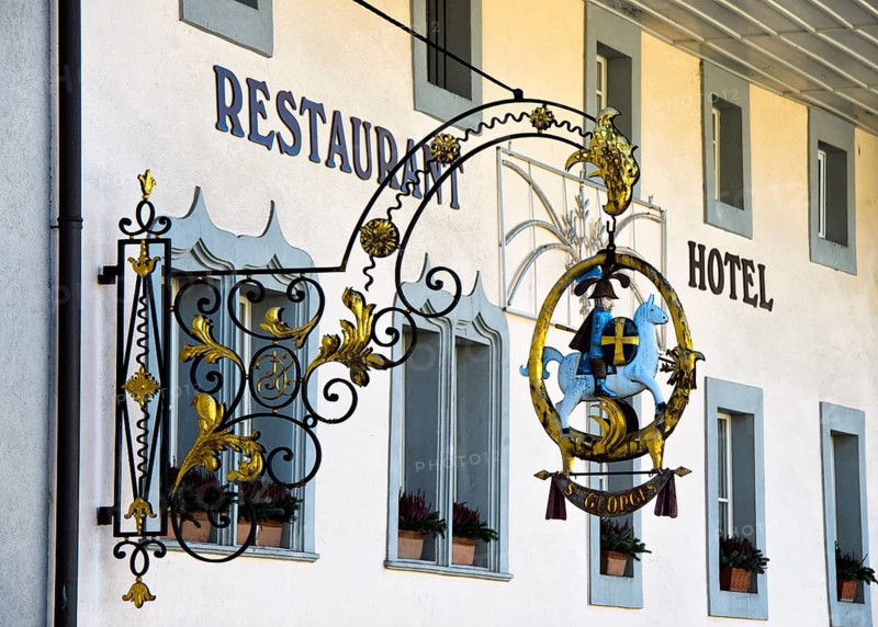 Restaurant sign with the horse-rider St. Georg