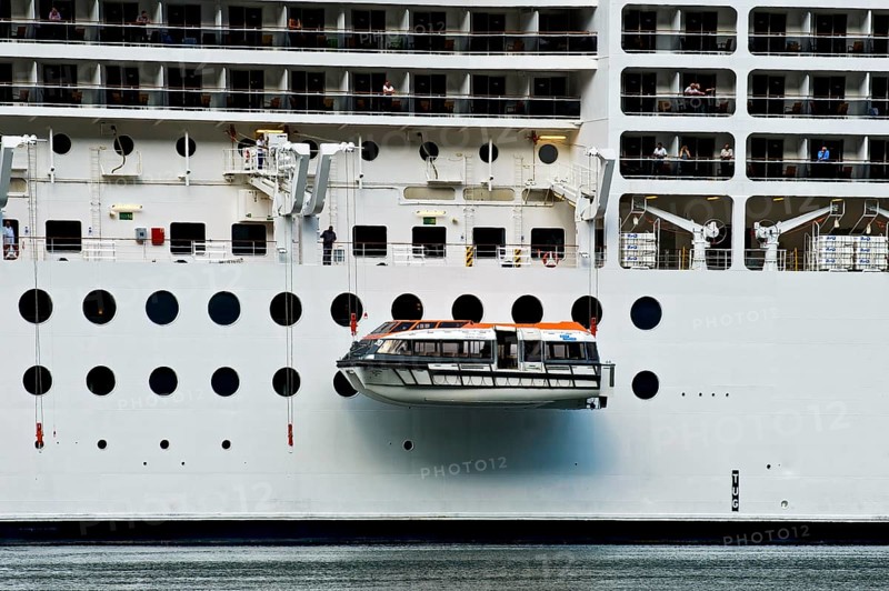 Lifeboats being lowered into the water