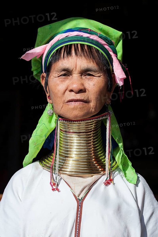 Woman from the tribe of the Padaung in typical dress and headgear