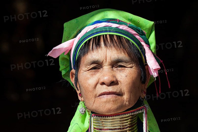 Woman from the tribe of the Padaung in typical dress and headgear