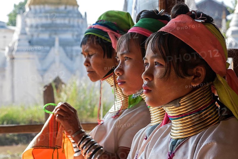 Women from the Padaung tribe in typical dress and headgear