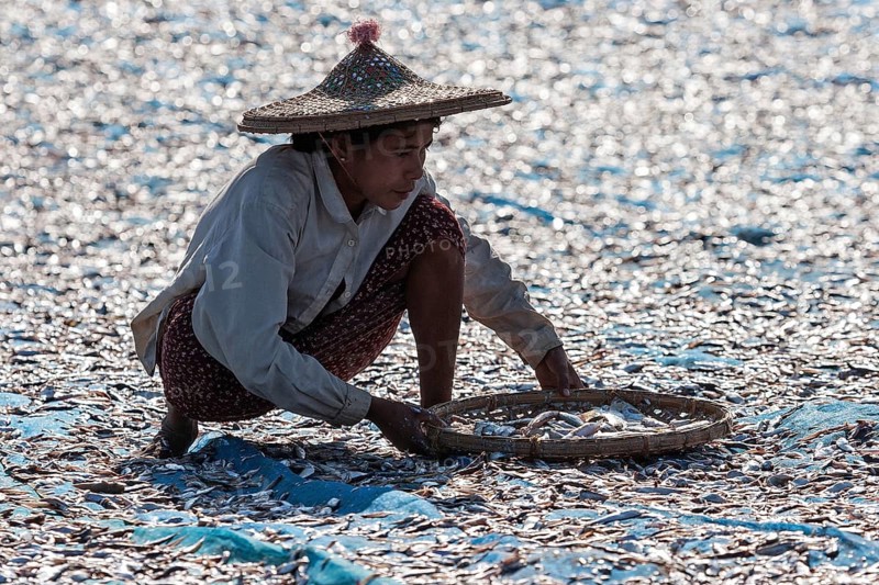 Local woman wearing straw hat