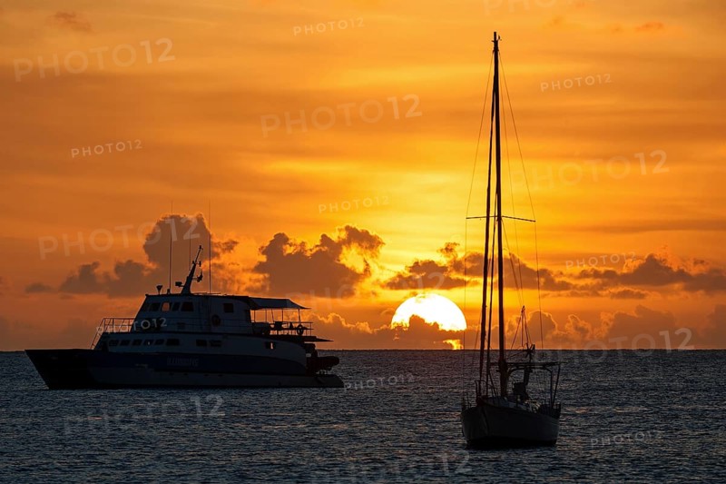 Sunset over the sea in the Beau Vallon Bay