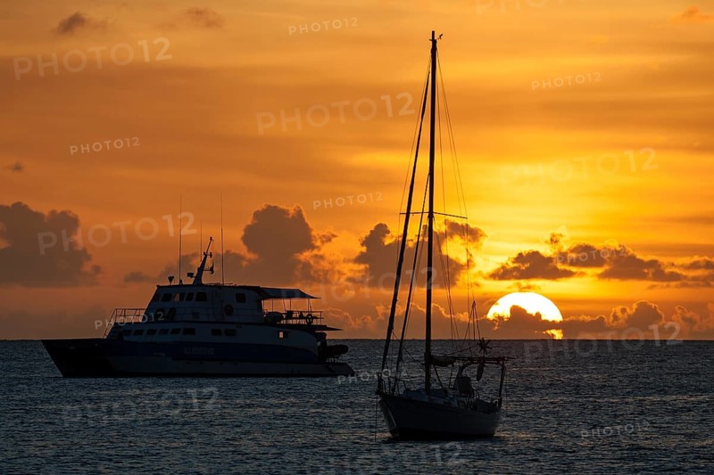 Sunset over the sea in the Beau Vallon Bay