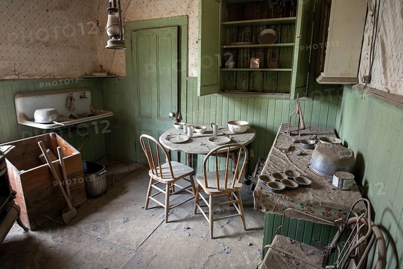 A kitchen in an old house located in a ghost town