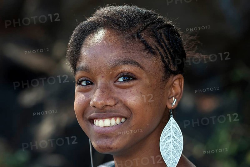 Local girl with silver earrings
