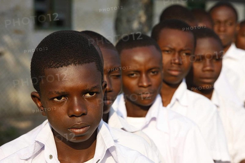 Group of students in schoolyard during morning assembly