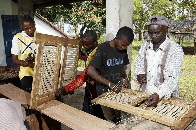 Apprentices working on chair