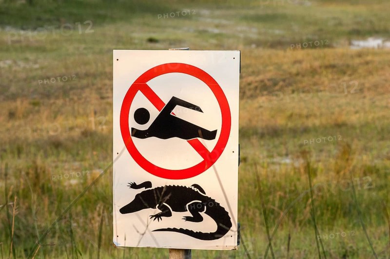 Sign swimming forbidden because of crocodiles