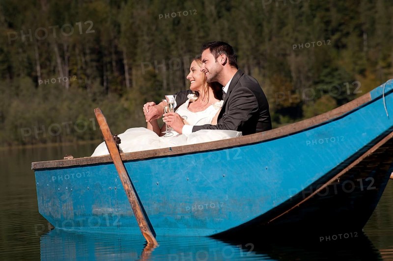 Wedding couple in a rowboat