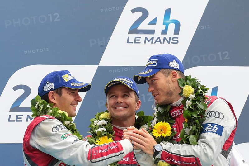 The drivers of the third-placed Audi R18 e-Tron Quattro from Audi Sport Team Joest
