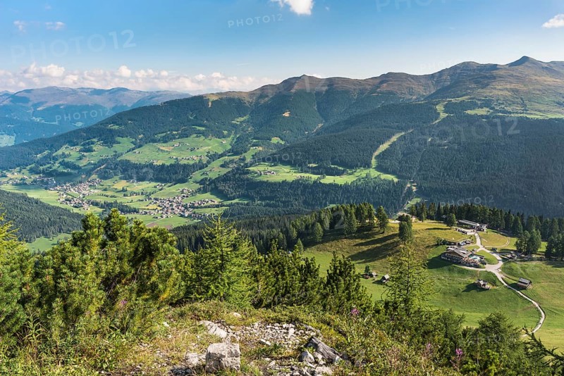 View from the Croda Rossa heads to the Rotwandalm with mountain station of the cable car
