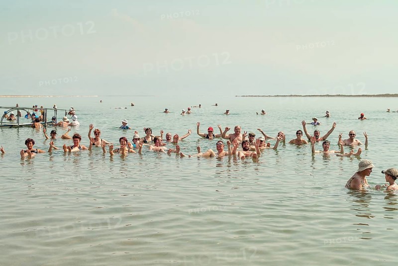 Tourists bathing in the Dead Sea
