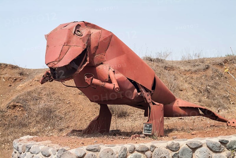 Dinosaurs statue from metal parts