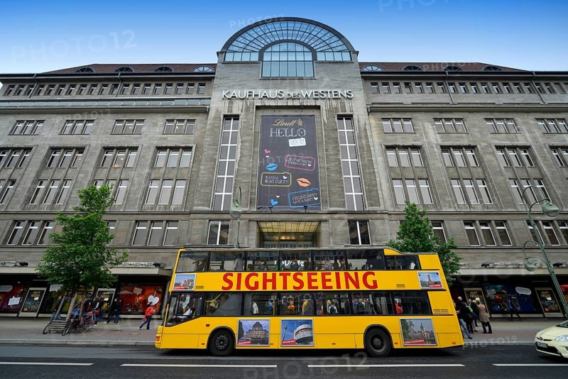 Sightseeing bus in front of the shopping center KaDeWe