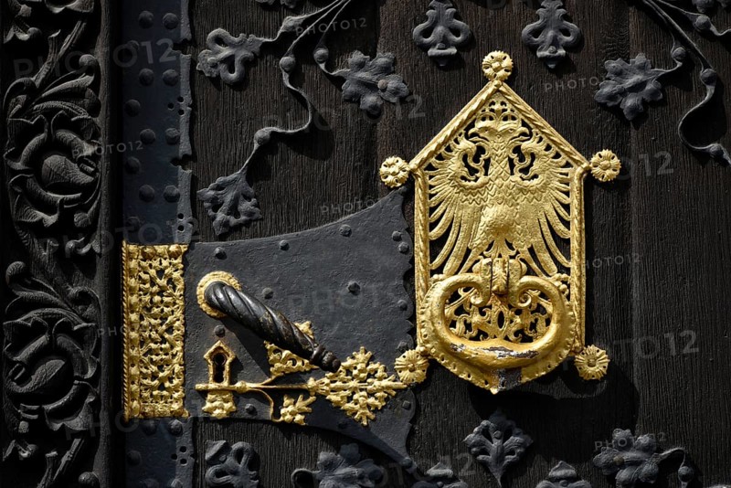 Golden knocker and doorknob