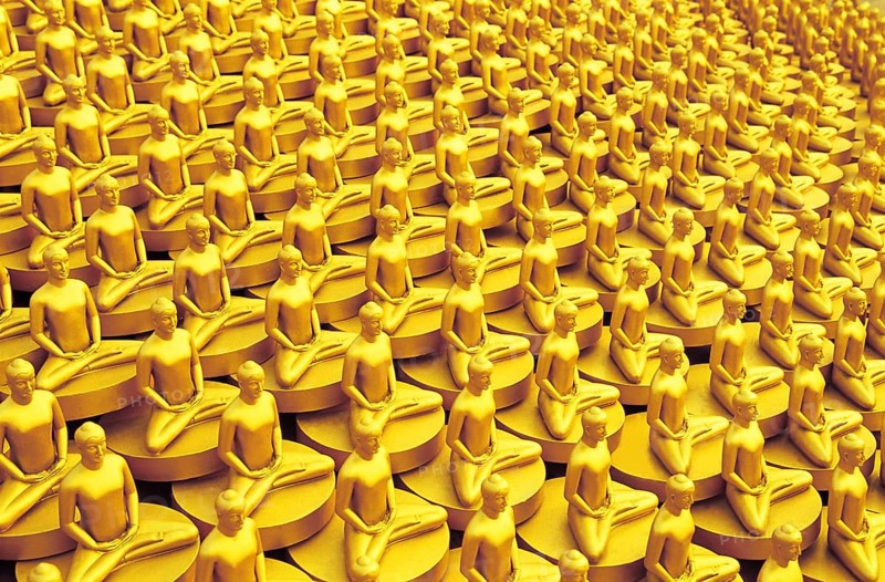 Small golden Dhammakaya Buddha statues at the Chedi
