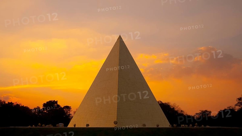 Now Chand Khonnokyoong Memorial Hall at the at Phra Dhammakaya temple at sunset