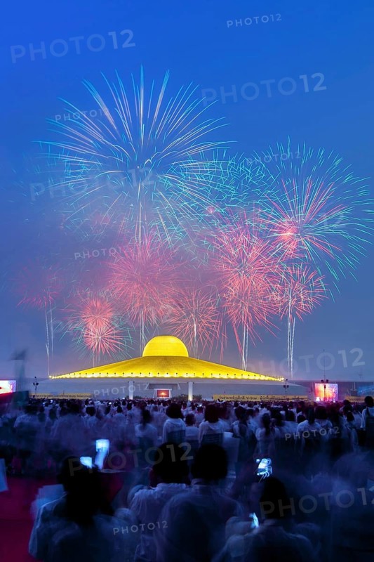 Fireworks behind the Chedi Mahadhammakaya Cetiya of the Wat Phra Dhammakaya temple