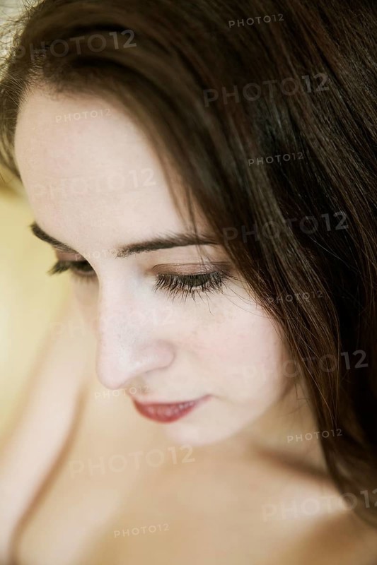 Young woman with dark brown hair