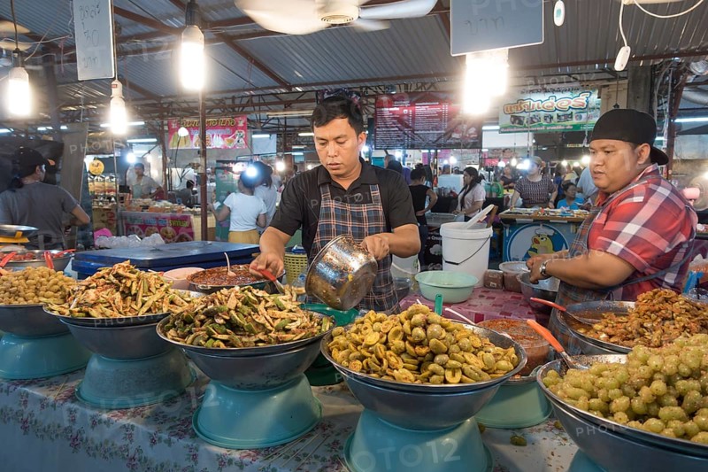 Market stall with pickled Thai fruits