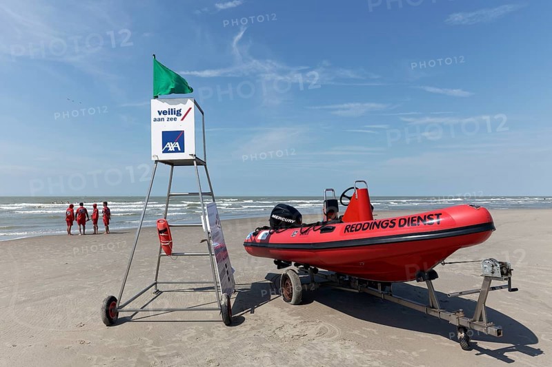 Lifeguard station with lifeboat on the beach