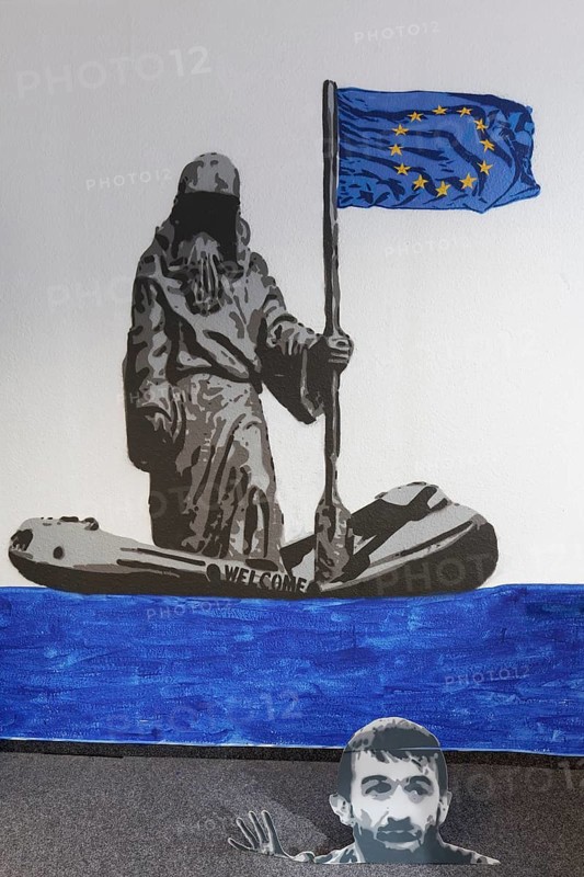 Death waiting in boat with European flag