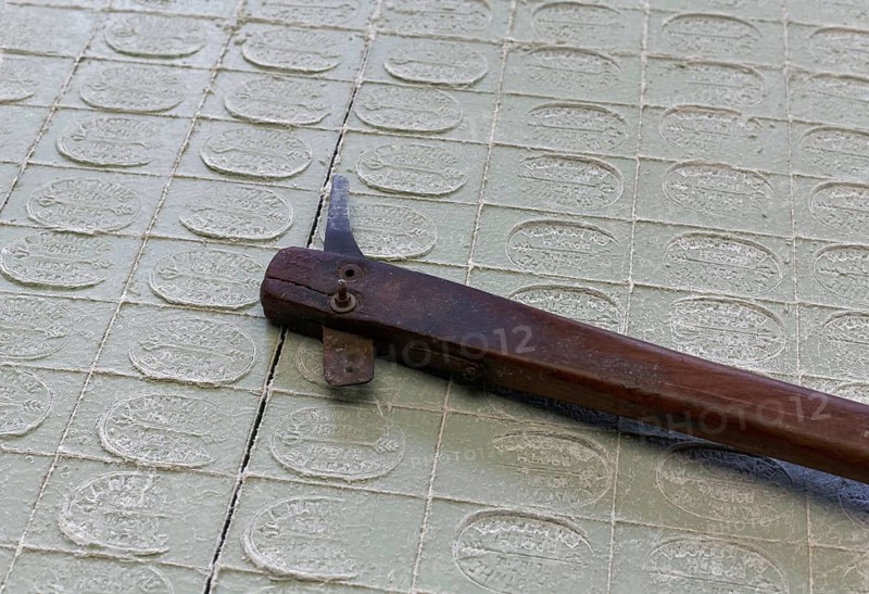 Cut pieces of olive soap and cutting tool