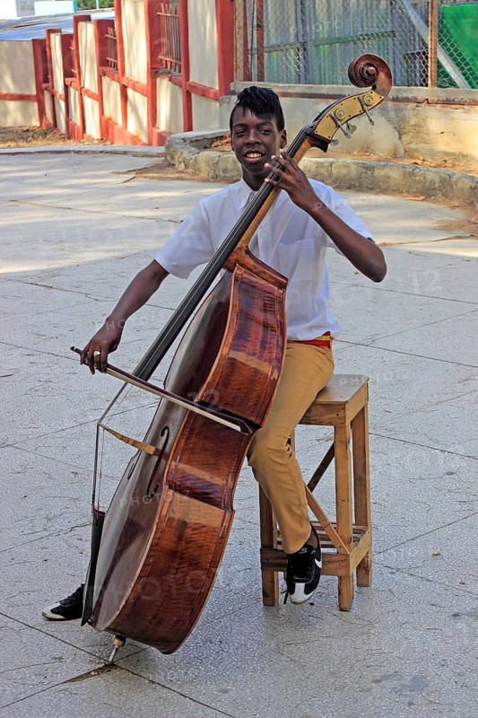 Music student playing the bass