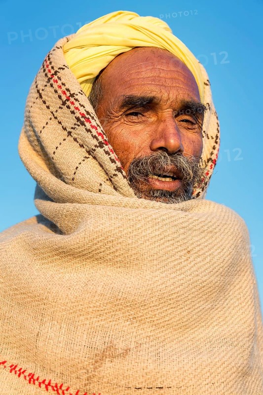 Indian man wearing a yellow turban