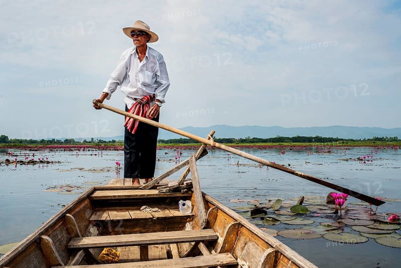 Boatman on the lake