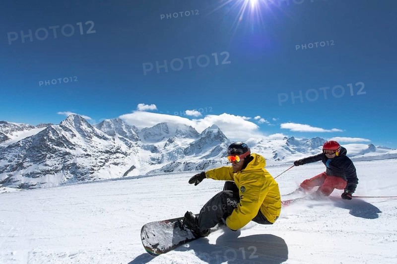 Skier and snowboarder