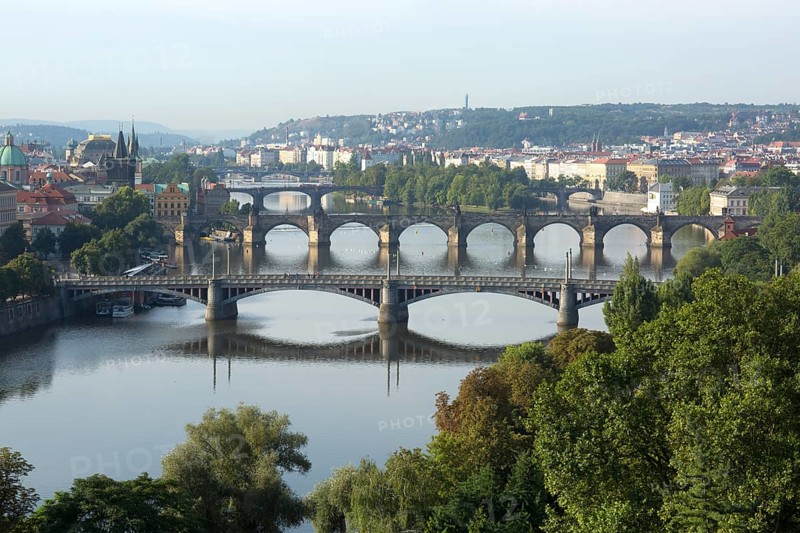 View from Letna Hill over the Vltava River bridges to the historic centre with bridge tower
