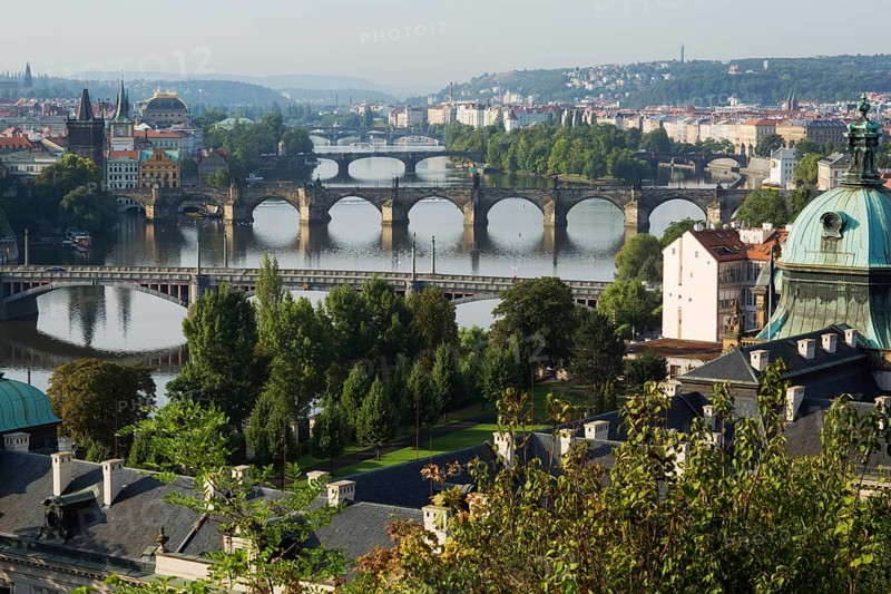 View from Letna Hill over the Vltava River bridges to the historic centre with bridge tower