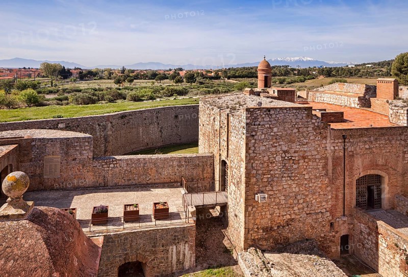 Rooftops to the Pyrenees at Fort de Salses