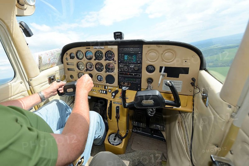Inside view of single-engined sports plane cockpit