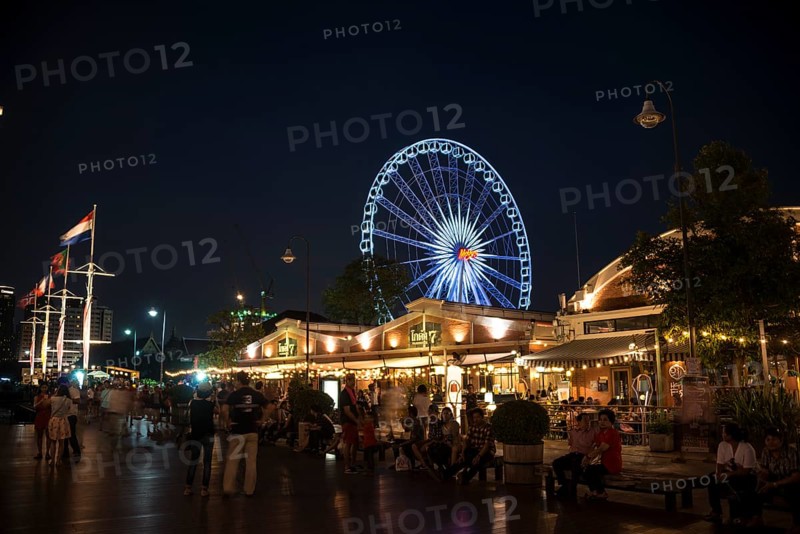 Asiatique Riverfront promenade with Ferris wheel at night