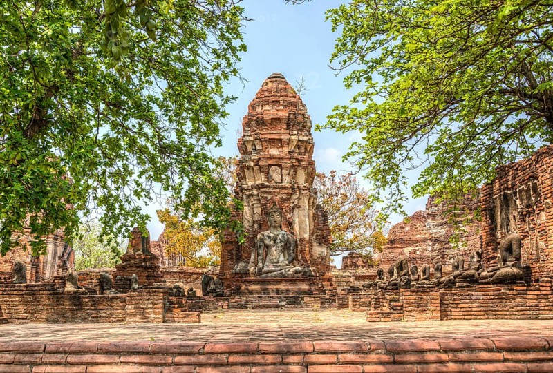 Temple complex with stupa and large Buddha statue
