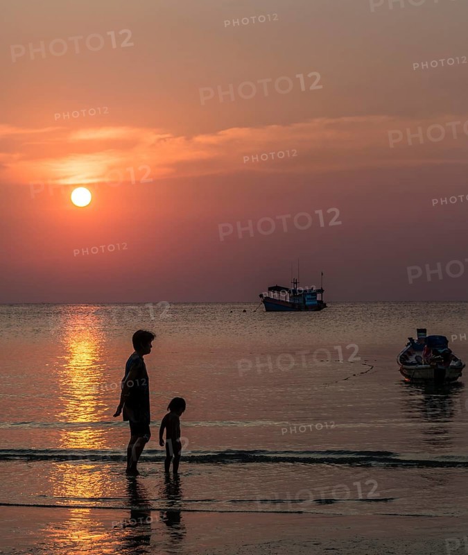 Woman and child in water