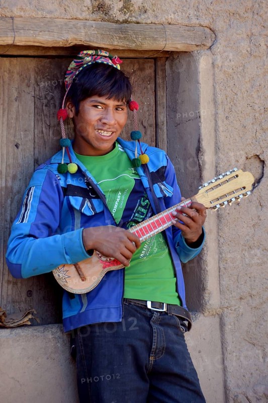 Student playing ukulele at boarding school
