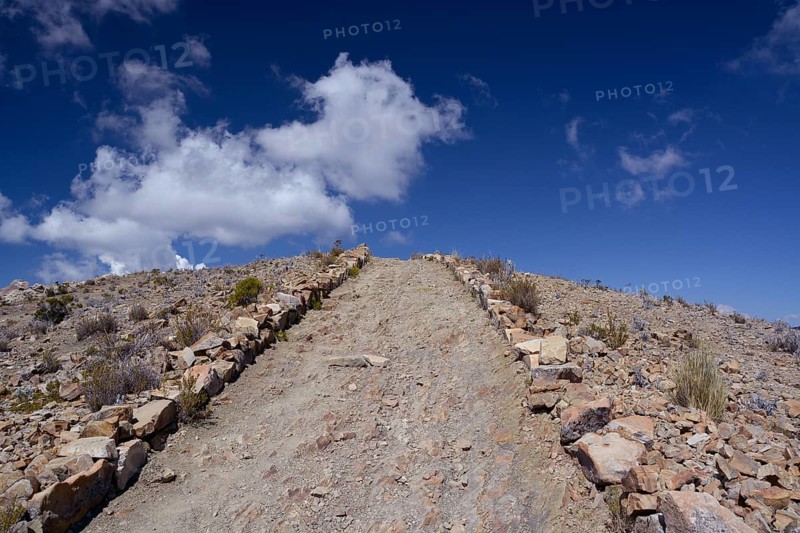 Footpath through barren stony land