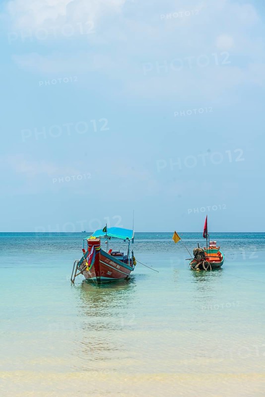 Longtail boats on the sea