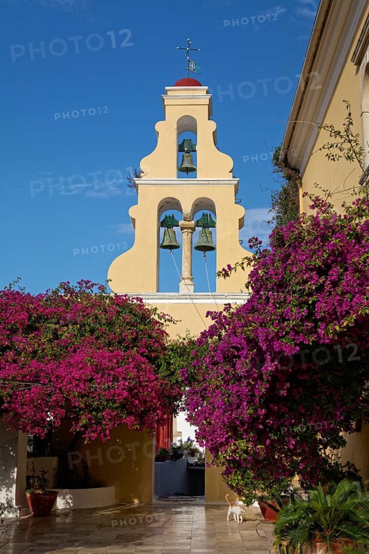 Courtyard with tower and bougainvillea