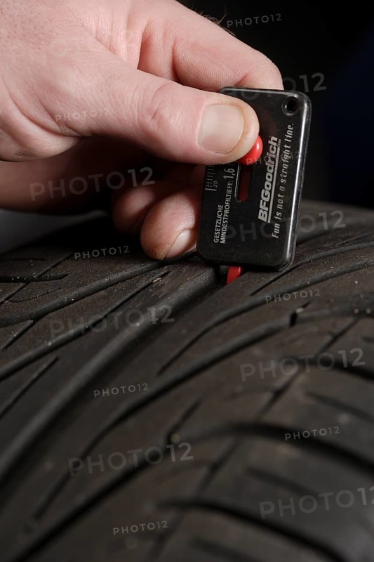 Measuring a car tire's tread depth