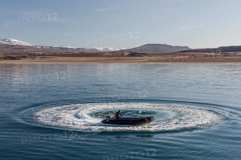 Guide in a Zodiac inflatable boat