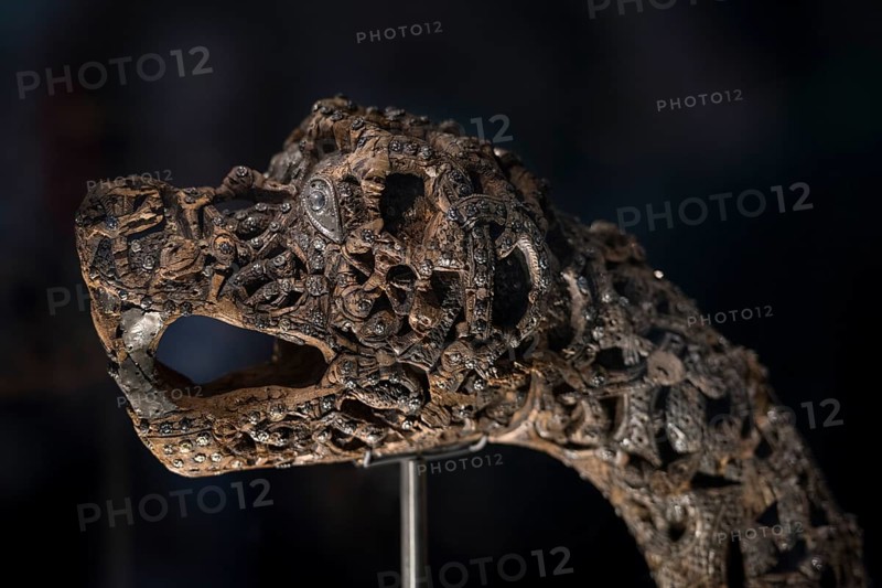 Wooden carved animal head post